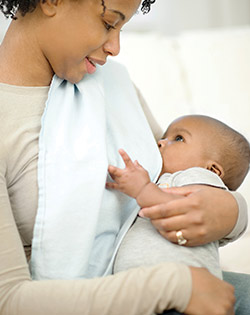 MOTHER BREASTFEEDING BABY