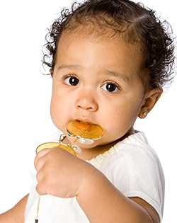 BABY WITH TEETHING TOY