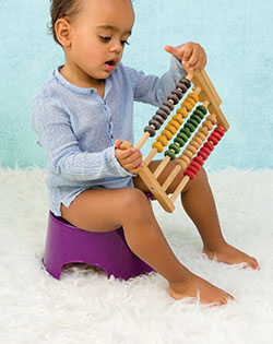 BABY SITTING ON A POTTY